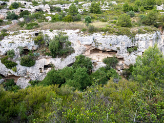 Gravina of Madonna della Scala. The gravina is a typical canyon of Puglia and Basilicata with cave...