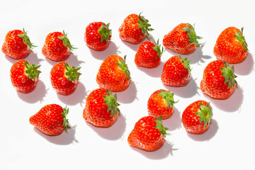 A lot of strawberries on a white background.