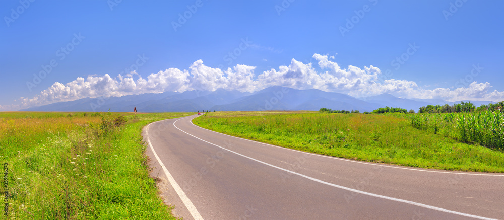 Wall mural road and mountain range fegerash, romania. panorama, high resolution.