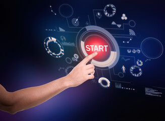 Man pointing at start icon on dark background, closeup