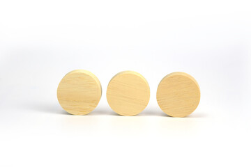 Front surface of yellow wood cylinder isolated on white clean space  background, for icon  symbol logo or text presentation on wood surface