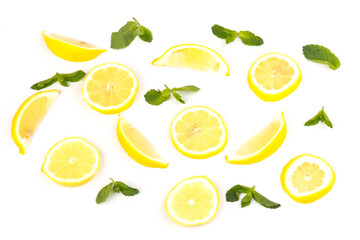Naklejka na ściany i meble Group of lemons with mint leaves, isolated on white background