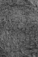 Dark grey limestone background used for kitchen worktop, table, window sill, fence. Black and white igneous brick stone texture.Text sign advertising design mockup.Architecture detail natural backdrop