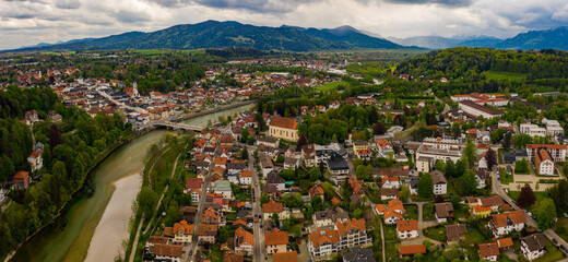 Fototapeta na wymiar Aerial view of the city Bad Tölz in Germany, Bavaria on a sunny spring day during the coronavirus lockdown. 