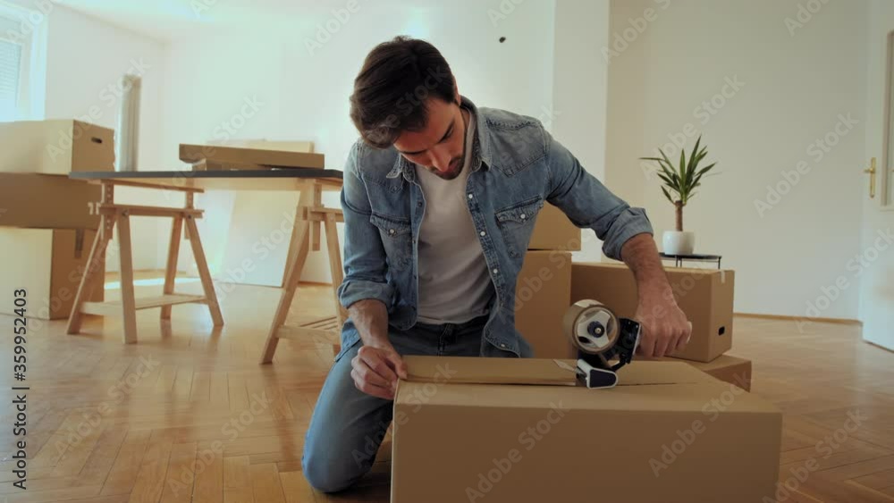 Wall mural Tape your boxes securely to prevent damage while moving