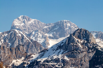 Fototapeta na wymiar Triglav mountain covered in spring snow