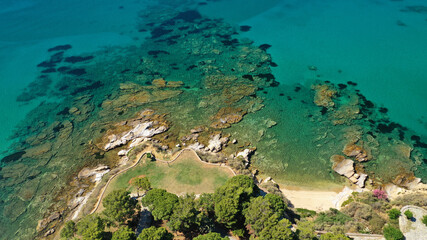 Aerial drone photo of tropical Caribbean bay with white sand beach and beautiful turquoise and sapphire clear sea
