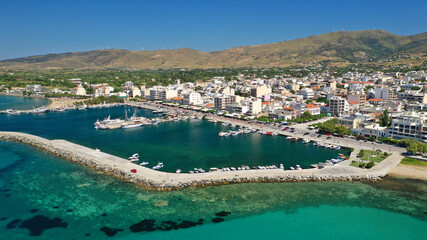 Fototapeta na wymiar Aerial drone photo of famous seaside town and port of Karistos in South Evia island, Greece