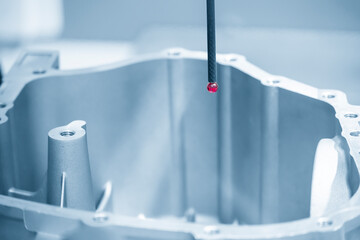 The CMM machine measuring the aluminium casting parts  by touching probe. The quality control of...