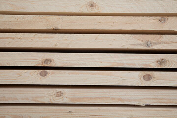 Obraz premium Warehouse with the production of woodworking sawmills, logs, boards and lumber