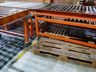 Cages security and roller lines in cargo warehouse and ready loading shipment to container truck...