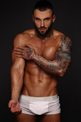 Sexy closeup portrait of handsome topless male model with beautiful eyes. Sexy man or muscular...