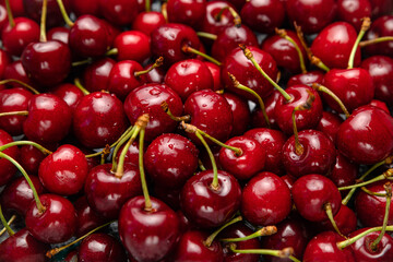 Fresh ripe black cherries background Top view 