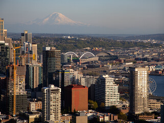 Mount Rainier frames the skyline of the City of Seattle Washington at Sunset