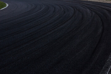Fototapeta na wymiar Motor Racing Track Corner Apex / Tire tracks on asphalt
