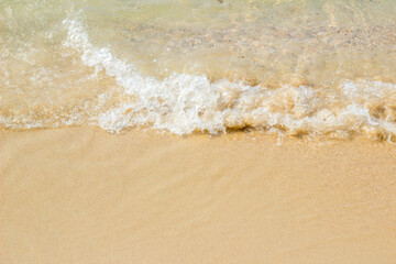Sandy beach and blue sea in summer