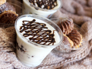 Tiramisu desserts in the cup and cookies