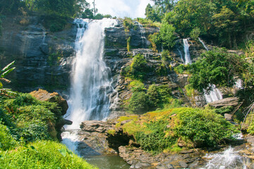 Fototapeta premium Water fall located in deep rain forest jungle named 