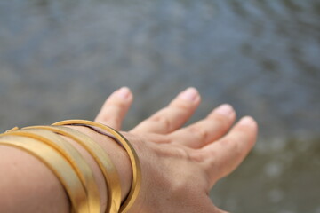 hand bracelet water fingers gold