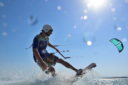 Kitesurfer against the sun, Red Sea, Egypt