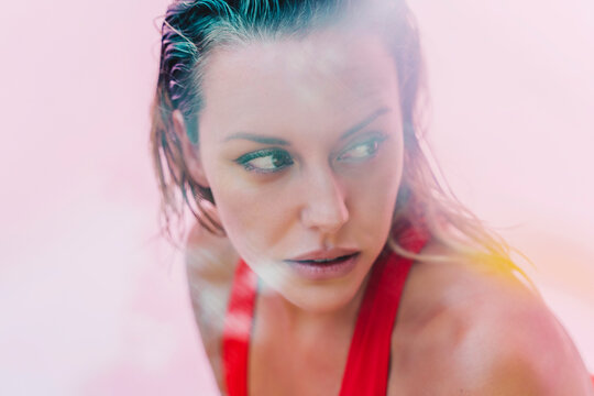 Portrait Of Beautiful Woman Wearing Red Swimsuit