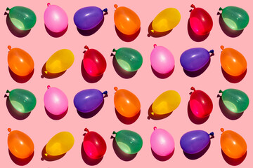 Pattern of rows of colorful water balloons
