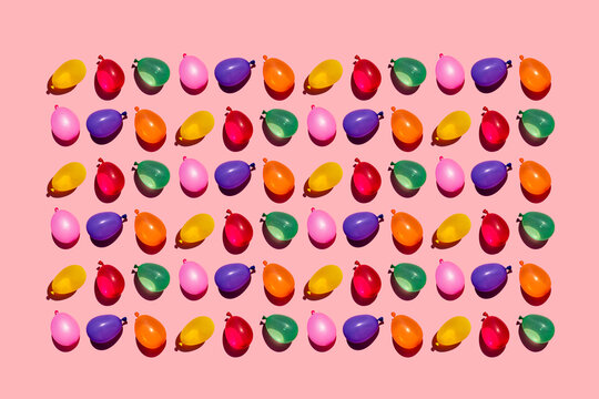 Studio shot of colorful water balloons forming rectangle