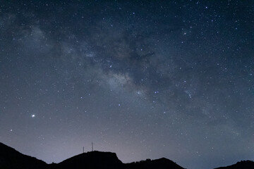The Milky Way over the horizon with Jupiter and Saturn