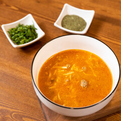 Tasty pasta soup top view