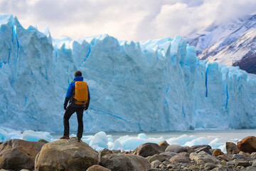Man in front of Perito Moreno Glacier, El Calafate, Los Glaciares National Park, Patagonia, Argentina