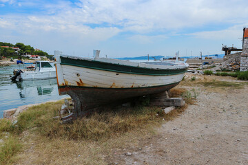 Old, abandoned, wooden boat from Vrgada island, off the Pakostane town shore, ready to be restored to previous state