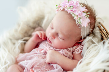 Sleeping newborn baby girl
