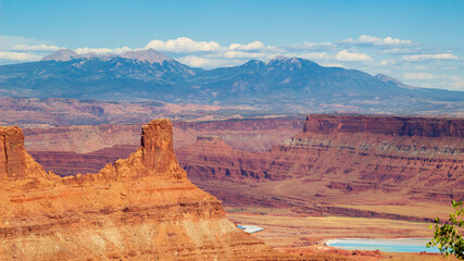 Grand view of Marlboro Point overlook and potash ponds in Canyonlands National Park and La Sal Mountain on the background