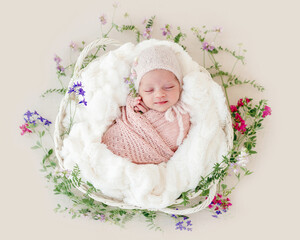 Sleeping newborn baby girl