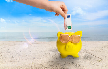 Geld für den Strand Urlaub im sparschwein sparen