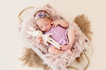 Sleeping newborn baby girl