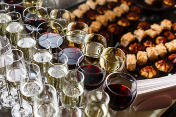 A dining table filled with wine glasses