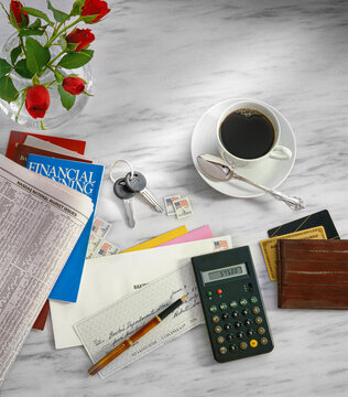 Personal Finance Items On Marble Table