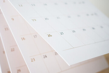 Calendar page flipping sheet close up blur background business schedule planning appointment meeting concept