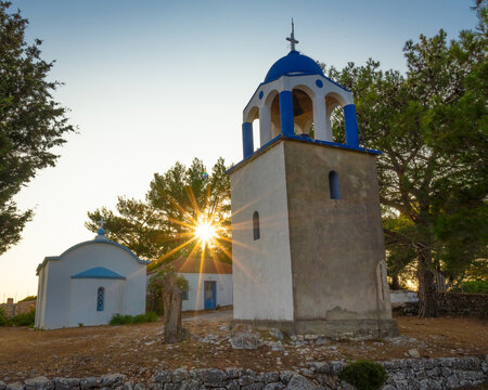 Beautiful sunset sun over the Monastery of Panagia Eleousa, Ithaka Island, Greece