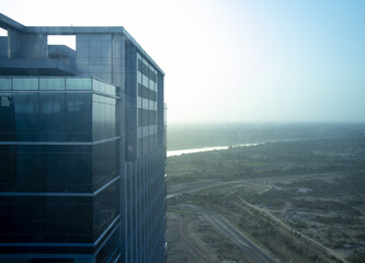 Windows of Skyscraper Business Office with blue sky, Corporate building in the city