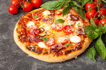 Homemade Pizza Margarita with Tomatoes, Basil and Mozzarella Cheese
