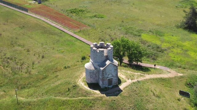Medieval stone church of St. Nicholas (Sveti Nikola) from 12th century near Nin, Dalmatia, Croatia, drone aerial view