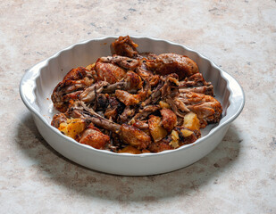 baked chicken legs with potato. Homemade freshly baked food. Crispy chicken with baked potatoes.