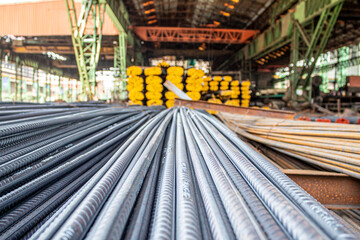 Steel rods or bars used to reinforce concrete.
