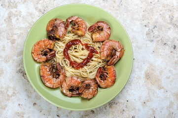 pasta with shrimp. traditional italian dish with shrimp. Home kitchen.