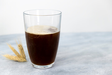 Traditional Russian drink kvass on wooden table