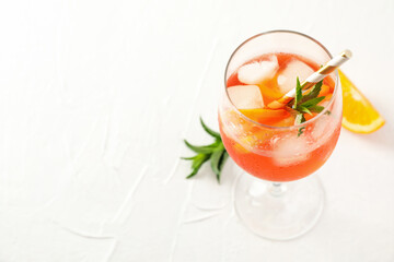 Composition with aperol spritz cocktail on white background. Summer drink