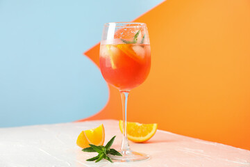 Composition with aperol spritz cocktail on color background. Summer drink