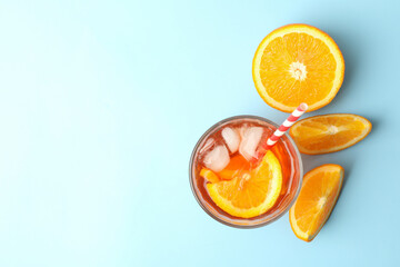 Aperol spritz cocktail on blue background. Summer cocktail
